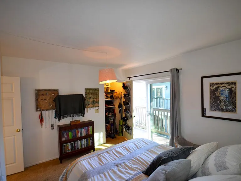 Bedroom 2 with balcony and 2 closets