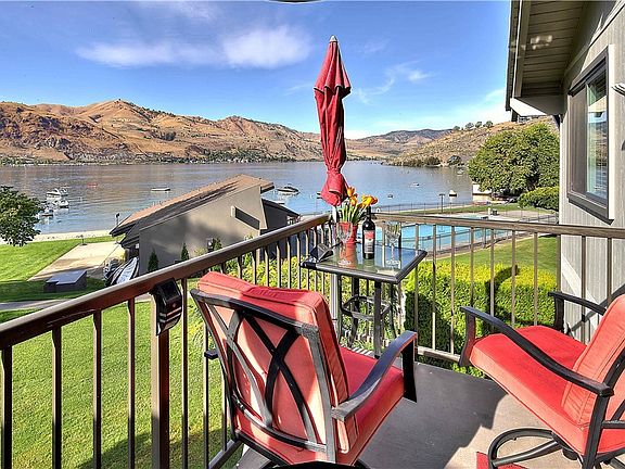 This is your view from your unit. this large deck overlooks the pool and has great views of the Lake and the Mountains. What a great way to start and end your day. Welcome Home!