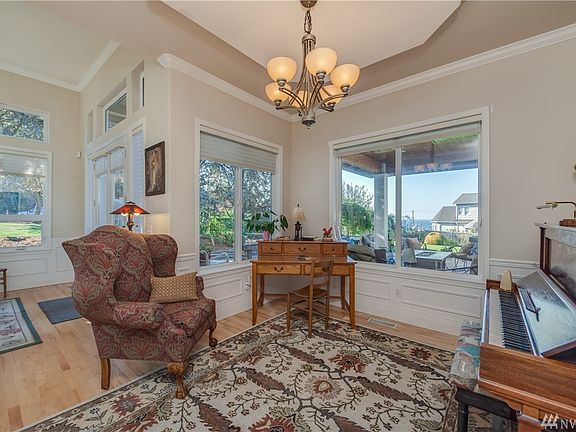 Just off the kitchen & entry, this parlor could be used as a formal dining room