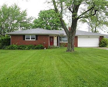 Exterior Front. Beautiful Spacious Yard!