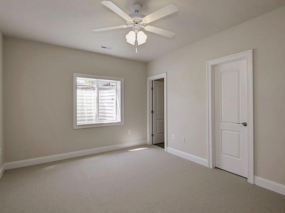 The bedroom available, including the bathroom and closet doors