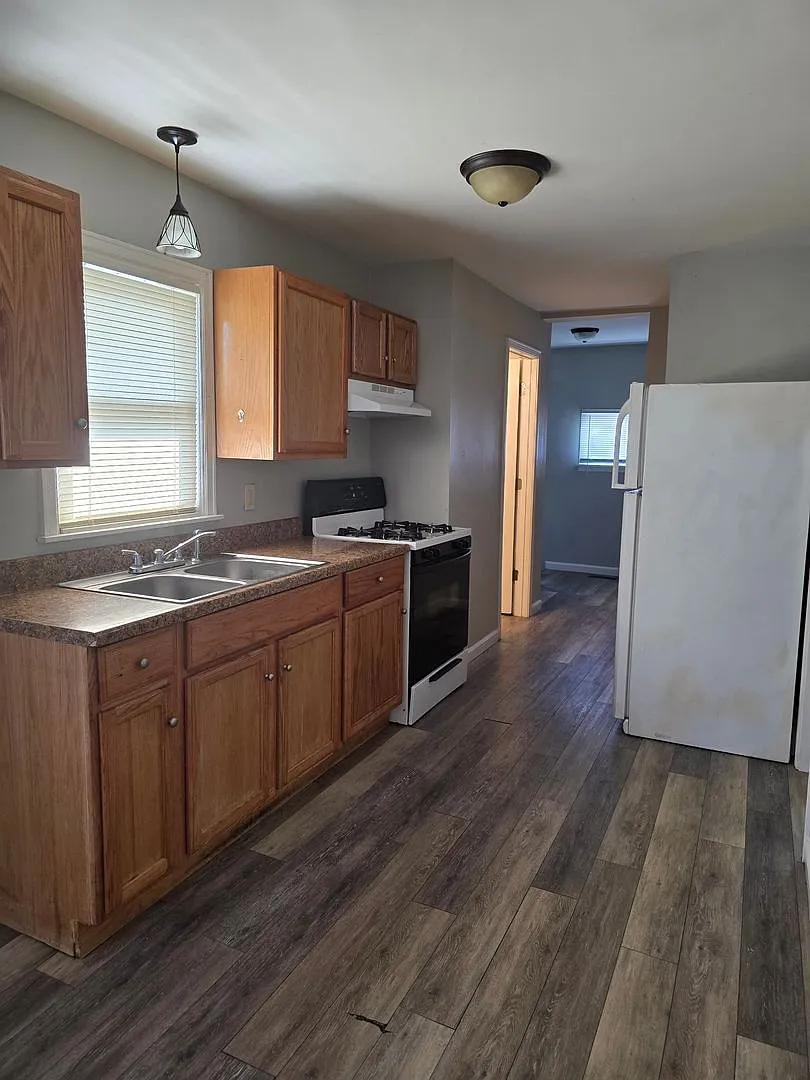 Updated 2-Bedroom, 1-Bathroom Home with Garage $1,200/Month — Photo 2