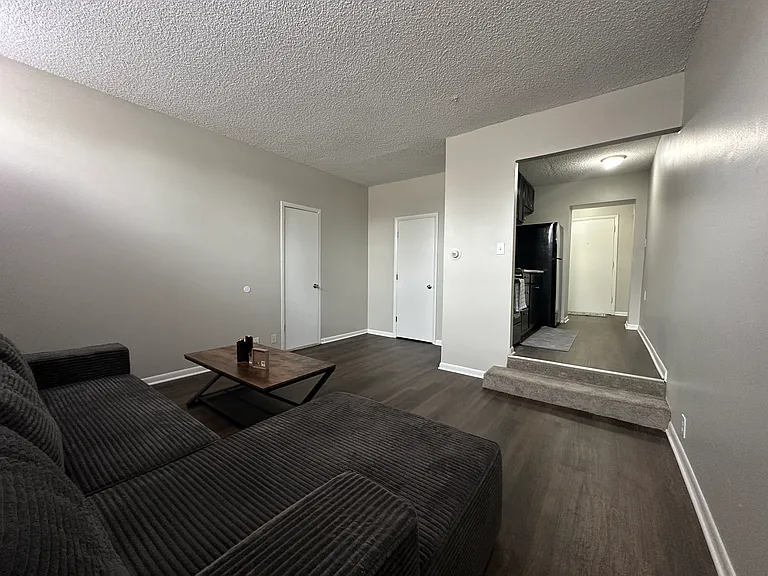 807 Living room Freshly painted, new plank floor, natural sun light through windows.