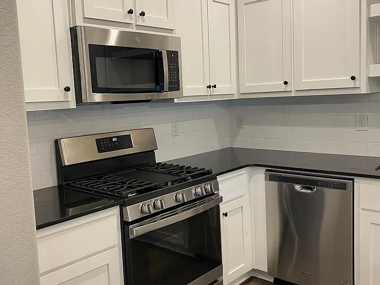 Kitchen with all new stainless steel appliances
