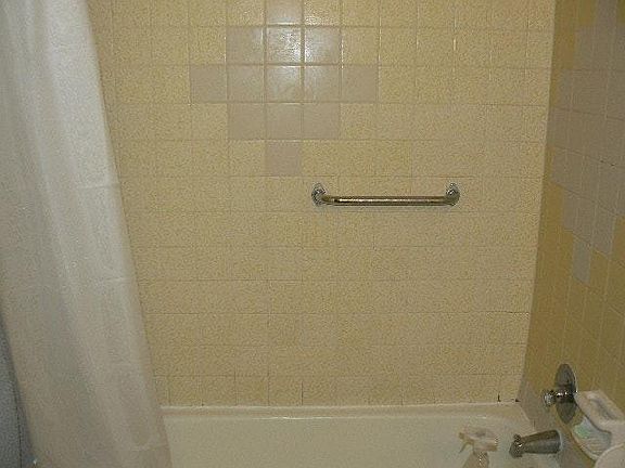 Tile tub surround in full bathroom upstairs.
