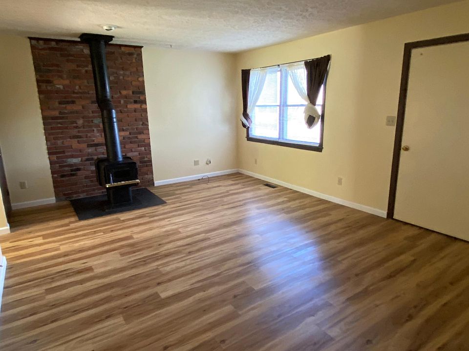 living room w/ wood burner living room