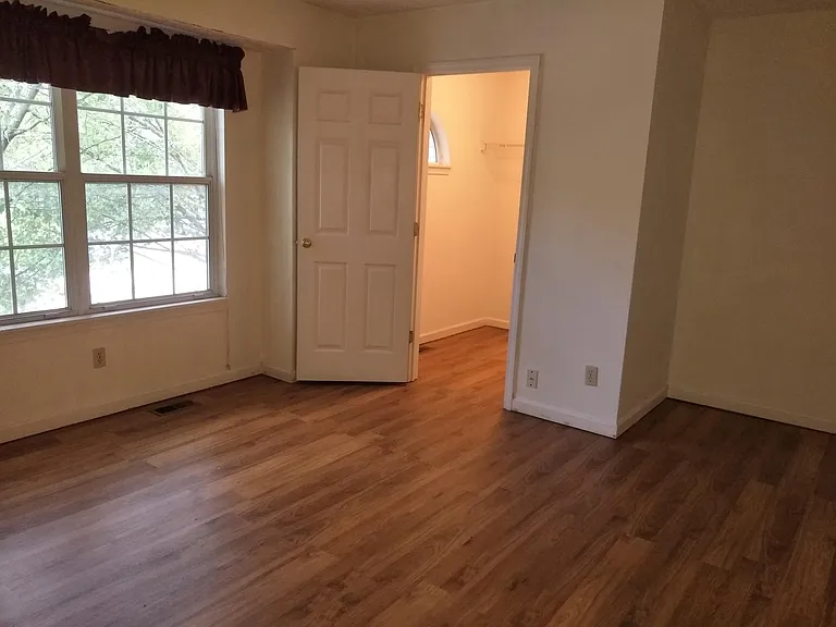 Master bedroom with large walk-in closet