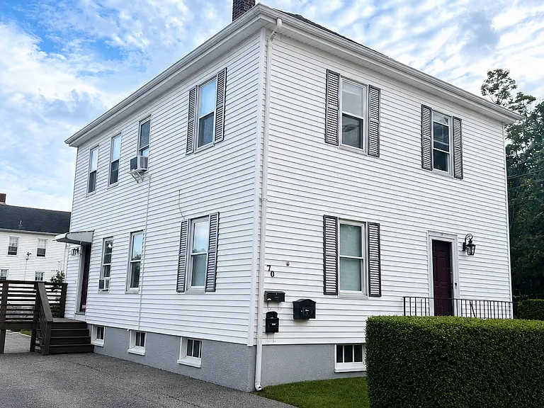 2 family with split driveway allows for 2 cars for each floor off street plus available on street parking.