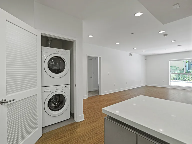 In-Suite Laundry and Open-Concept Living Rooms with Lots of Natural Light