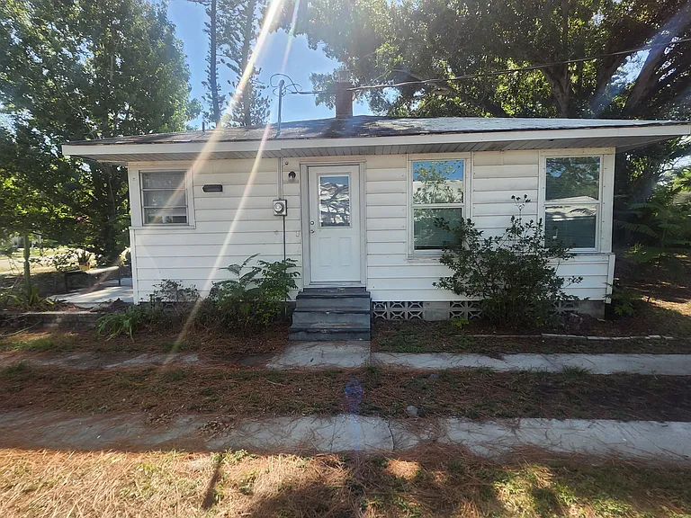 West section of double lot. Driveway entry into mud room