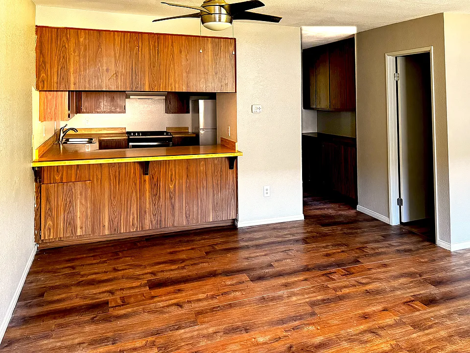 The dining area offers convenient counter space for a quick morning bite, yet room enough for a dining table.