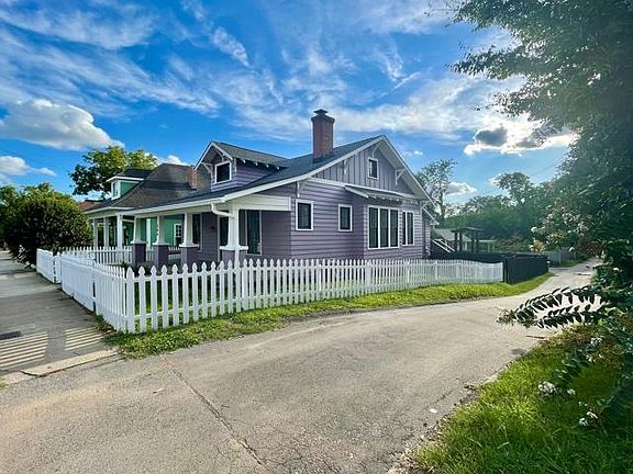 Side fully fenced yard. With large gate in back. Lawn service included.