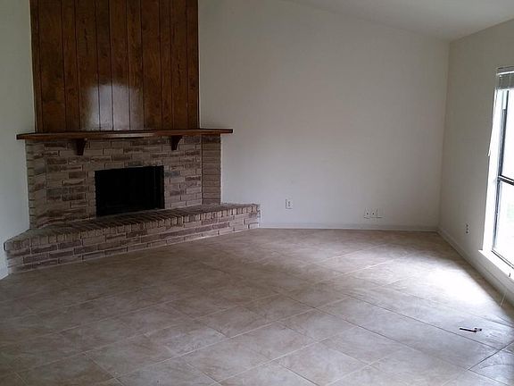 HUGE living room with NEW tile & paint