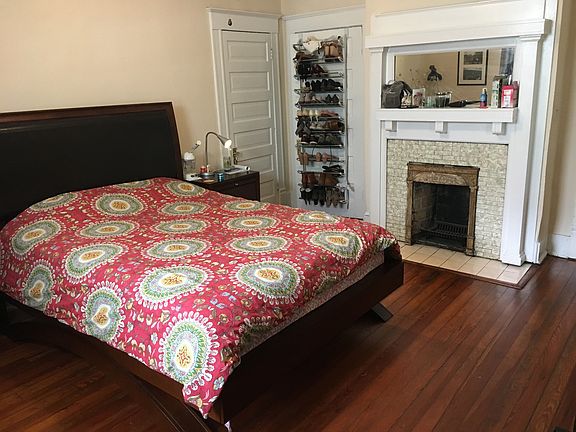 Authentic fireplace. Door on the left is a walk-in closet, d