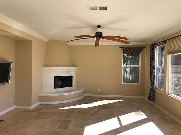 Family room with fireplace, all new blinds