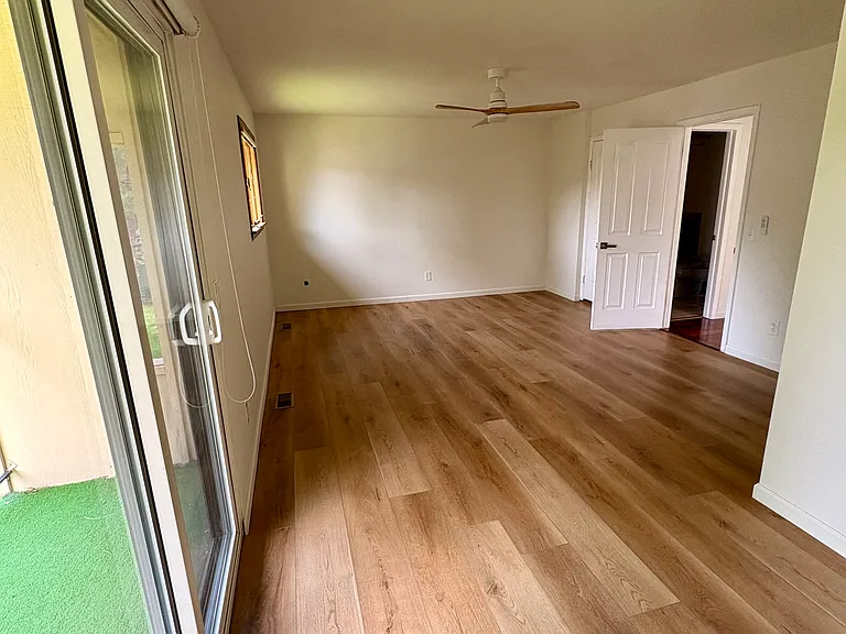 bedroom with balcony first floor