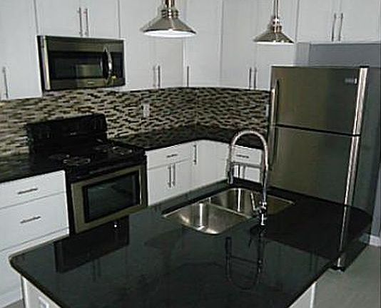 Modern kitchen with stainless steel appliances