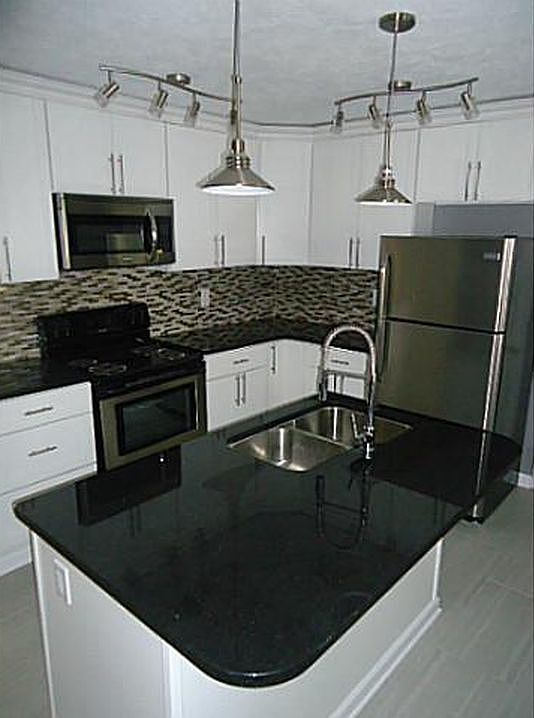 Modern kitchen with stainless steel appliances