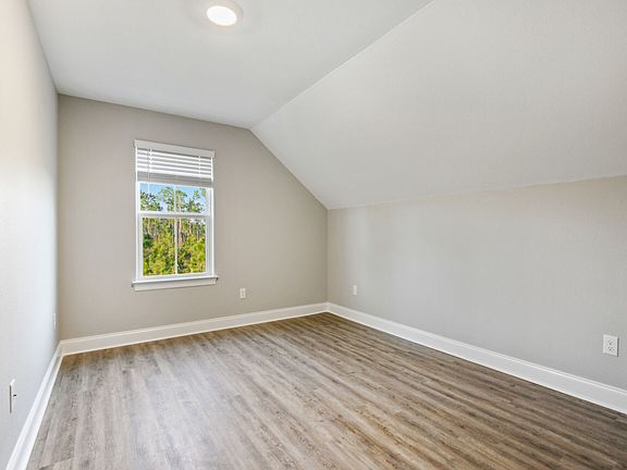 Secondary bedroom in the Elliott floorplan at a Meritage Homes community in Gulfport, MS.