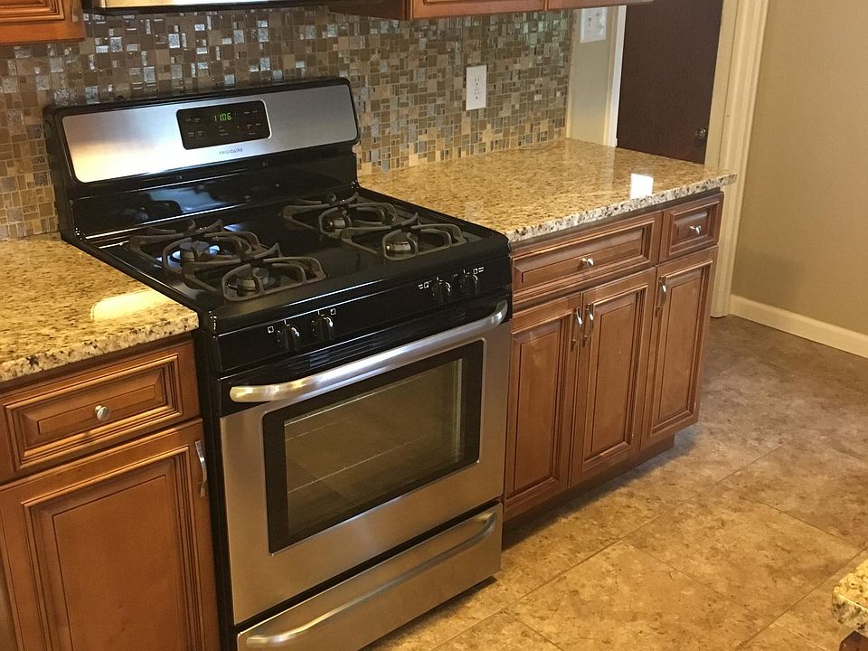 New in 2014 stove and microwave, tile floor
