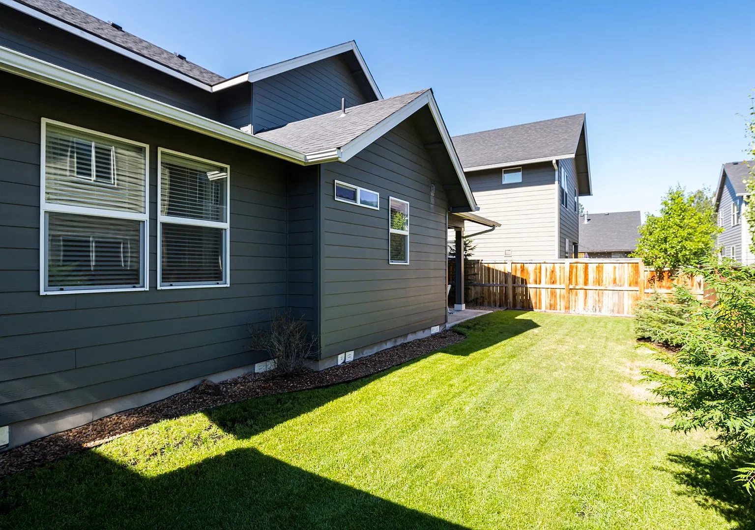 Stunning 4 bedroom home with an office, fenced yard, and farmhouse accents throughout. — Photo 4