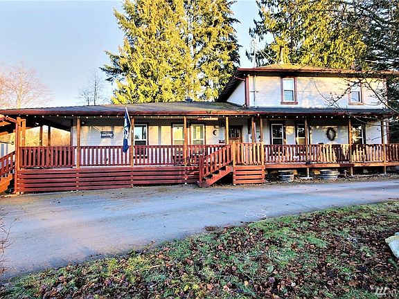 This early century farm house has had an addition to it and been remodeled from the studs in.  Sitting on a beautiful piece of acreage within the Tahoma School District boundaries and in the area of Maple Valley called Hobart...a hidden gem of an area!  Love the wrap around veranda that connects to the covered back deck!  Lots of opportunity to relax outside with a tasty beverage and a book, listening to nature.