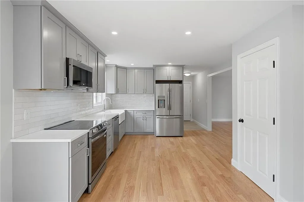 Open kitchen and living sightline at 14 Elaine Drive