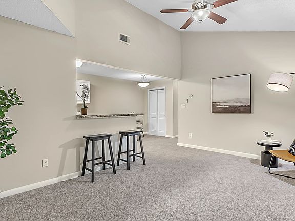 Relish into our spacious open-concept floor plans, offering large, versatile living rooms with a breakfast bar cut out for easy views into the kitchen for elevated entertaining.