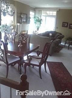 Large Living and Dining Area : Beautiful sunlit area with furnishings available for purchase.