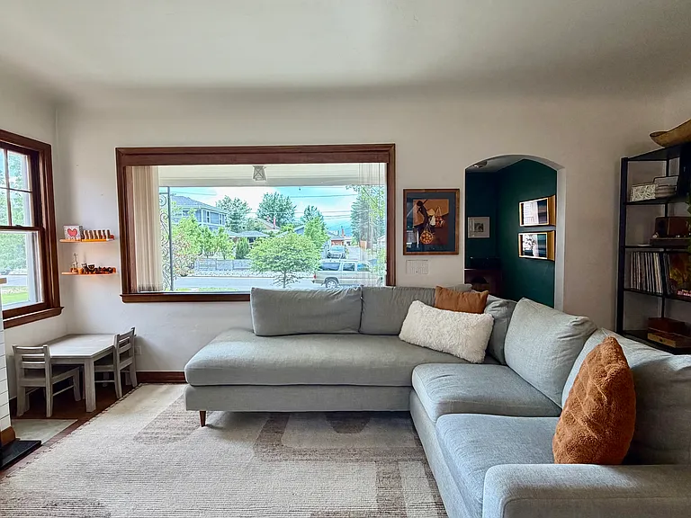 Enjoy a mountain view and stunning sunsets from the large picture window