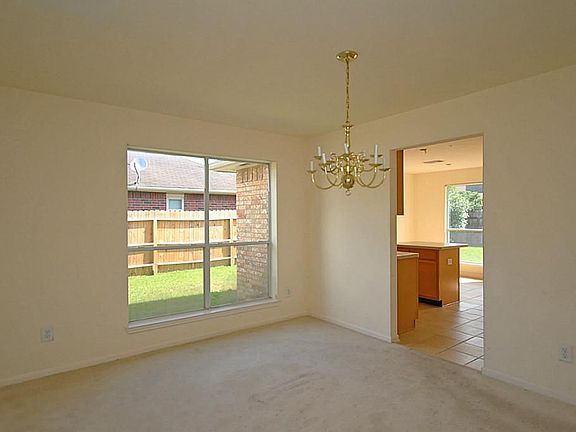 Formal dining room separates the living room and kitchen!