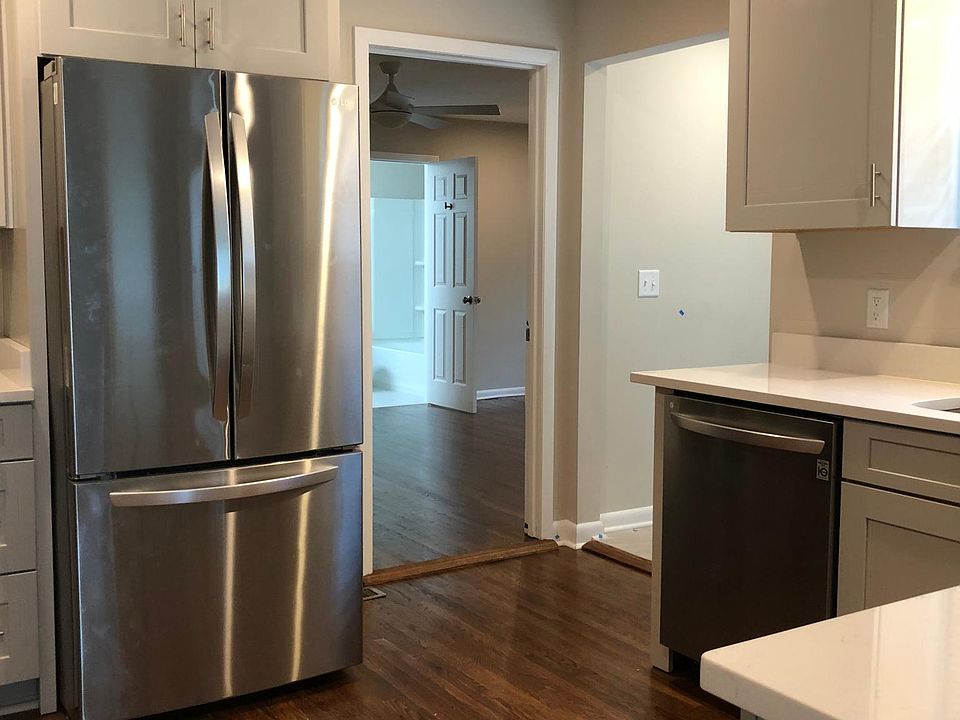 Entry to master bedroom and master bath from kitchen.