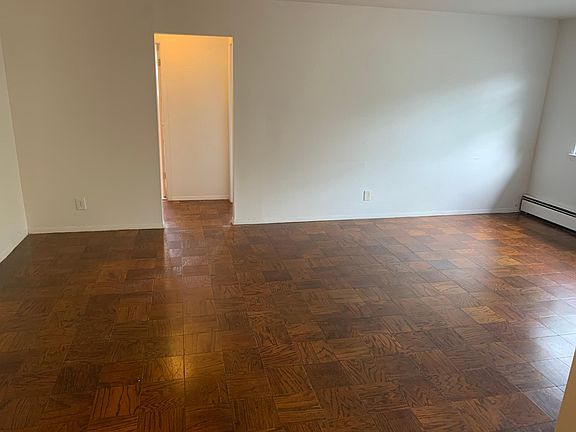 Full view of living room and dining area.