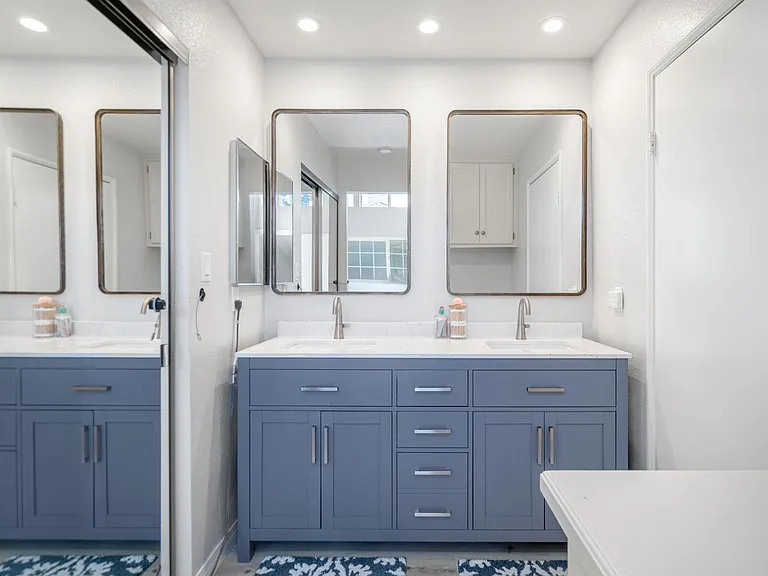 Modern bathroom vanity with dual sinks and plenty of storage