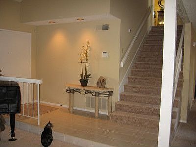 Raised entry and wide stairs.