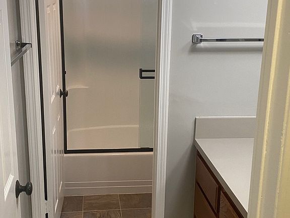 Bath with shower/tub