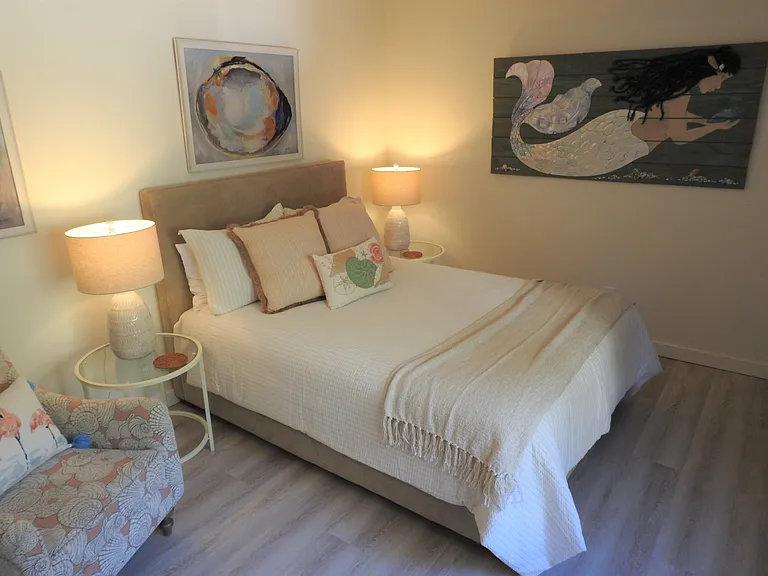Queen quest room. Soft color palette inviting guests to relax and enjoy.