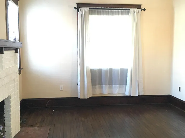 Living room with Hardwoods overlooking front porch