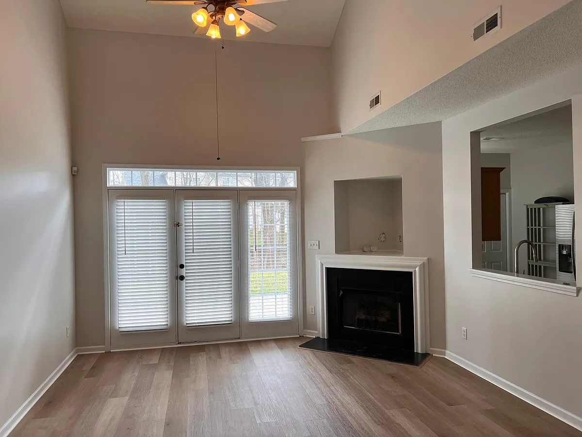 Living and dining room with fireplace - 1332 Anthem Ct