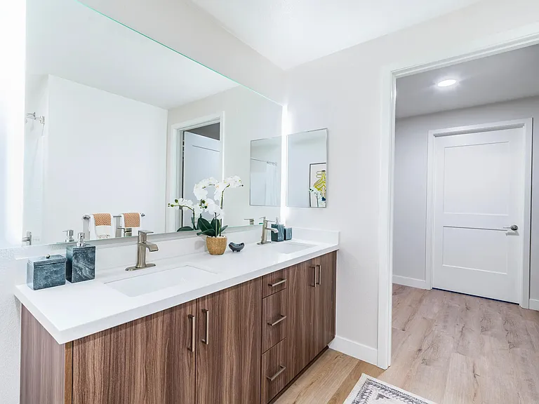 Indulge in luxury at Modera Pomona with our designer bathrooms featuring double vanities and sleek quartz finishes.