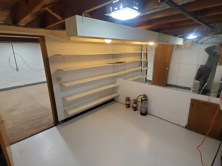 Basement - rec room / storage room.