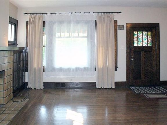 True to its era this home offers beautiful woodwork, doors and trim