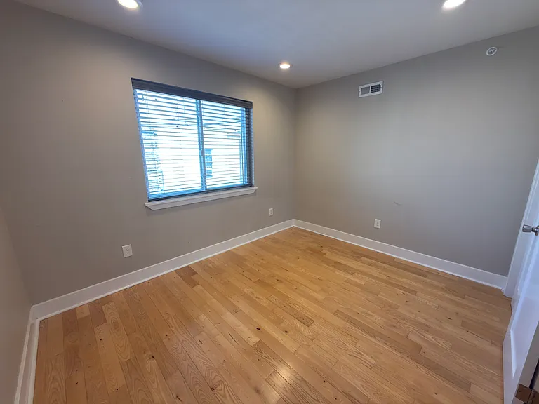 Spacious and bright second bedroom.