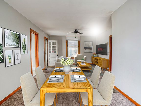Elevate your living experience at Teays Valley Property Management. This spacious dining area offers modern amenities and a warm atmosphere, perfect for gatherings. Explore your new home today and see how it can complement your lifestyle!