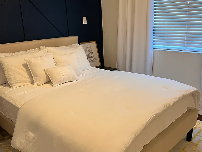 Current furnished first floor bedroom.