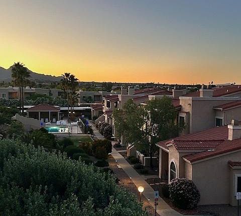Sunset view of property