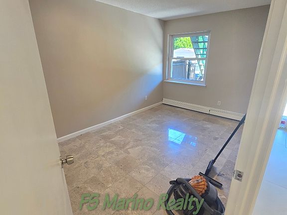 3rd image of 30-31 69th St #1
