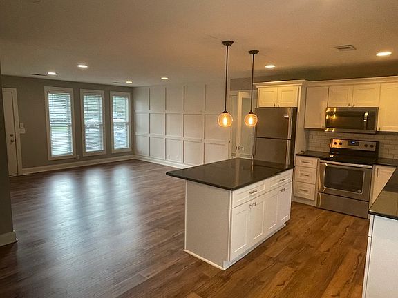 kitchen and living room looking toward front door