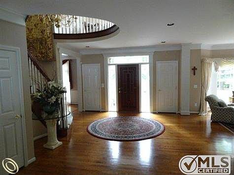 SPACIOUS ENTRY FOYER.