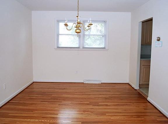 Formal dining room joins kitchen and living room.